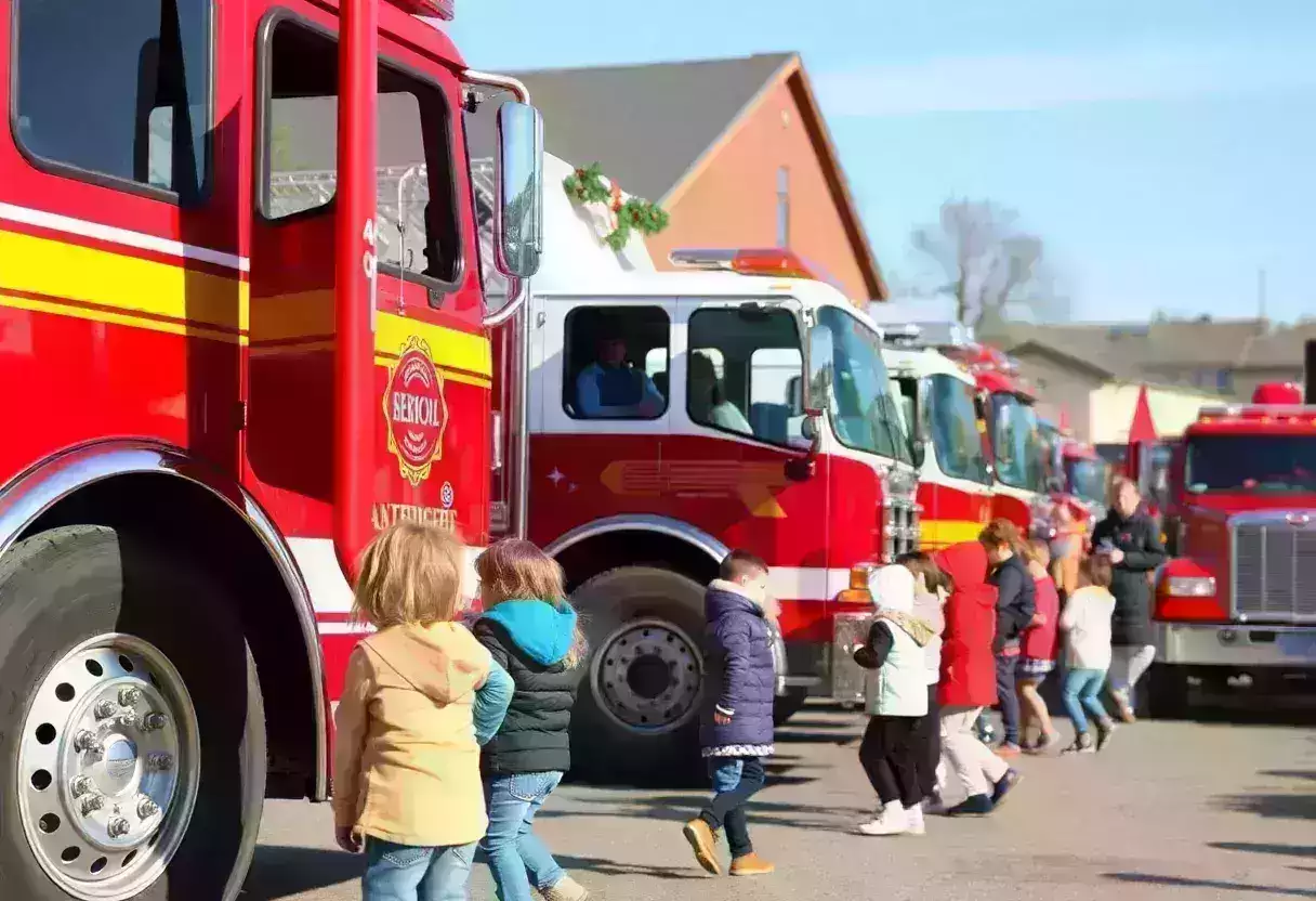 Children exploring trucks at the Touch-a-Truck event in Beaufort