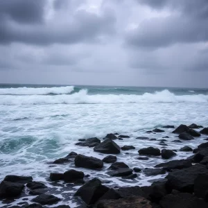 Waves crashing on a beach during Tropical Storm Chantal.