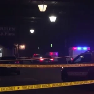 Police and emergency response scene outside Willie’s Bar and Grill after a shooting incident.