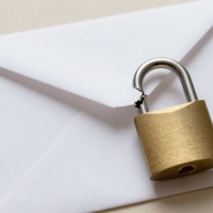 An illustration of a broken lock and an envelope representing mail security issues