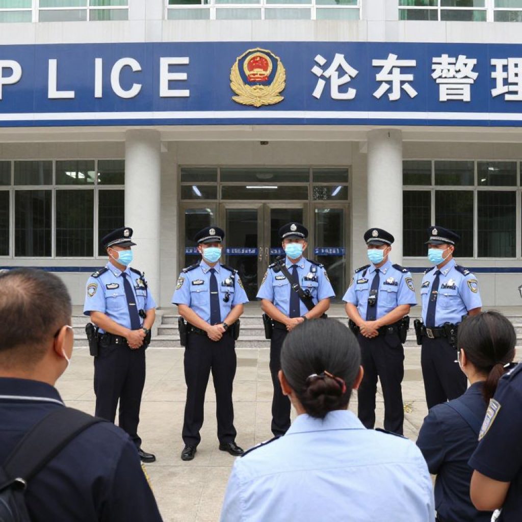 Community members discussing safety with police officers outside Beaufort Police Department