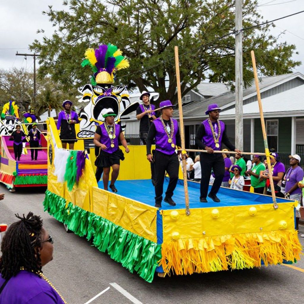 A colorful Mardi Gras parade in Port Royal with festive floats and crowds of people.