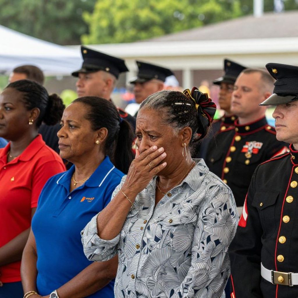 Families attending a Marine Corps graduation at Parris Island, showing diverse emotions.