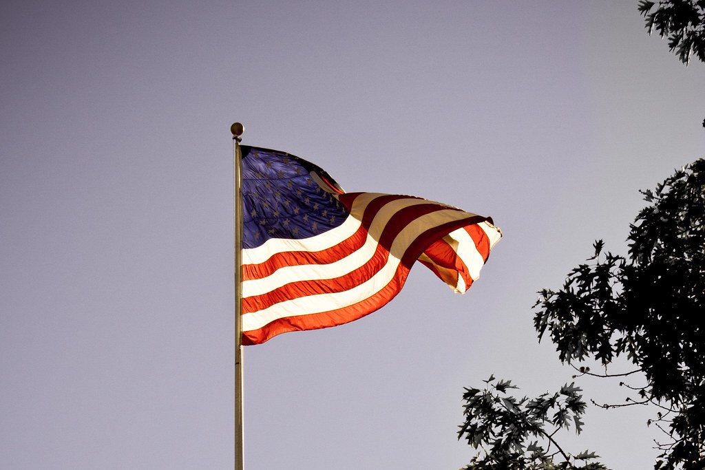 American flag waving against the sky